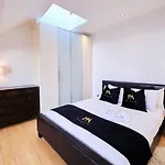 Pluxa Ebony Suite - Fireplace With Workspace & Unlimited Wi-Fi
