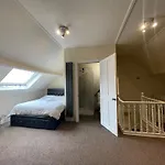 Room With Private Bathroom And Shared Kitchen