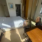 Room With Private Bathroom And Shared Kitchen
