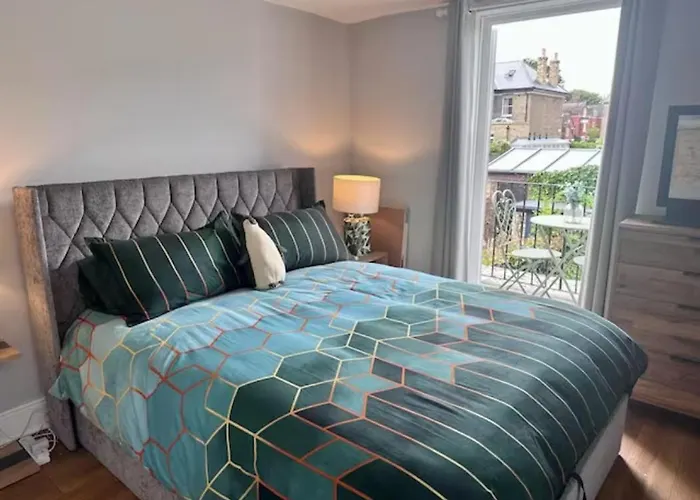 Room With Balcony Overlooking A Garden