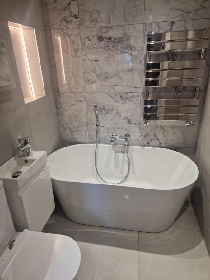 Collier's Wood En-suite Appartement