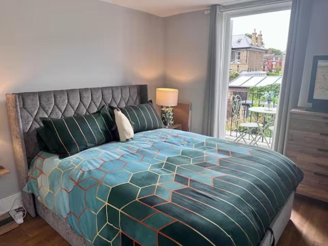 With Balcony Overlooking A Garden London