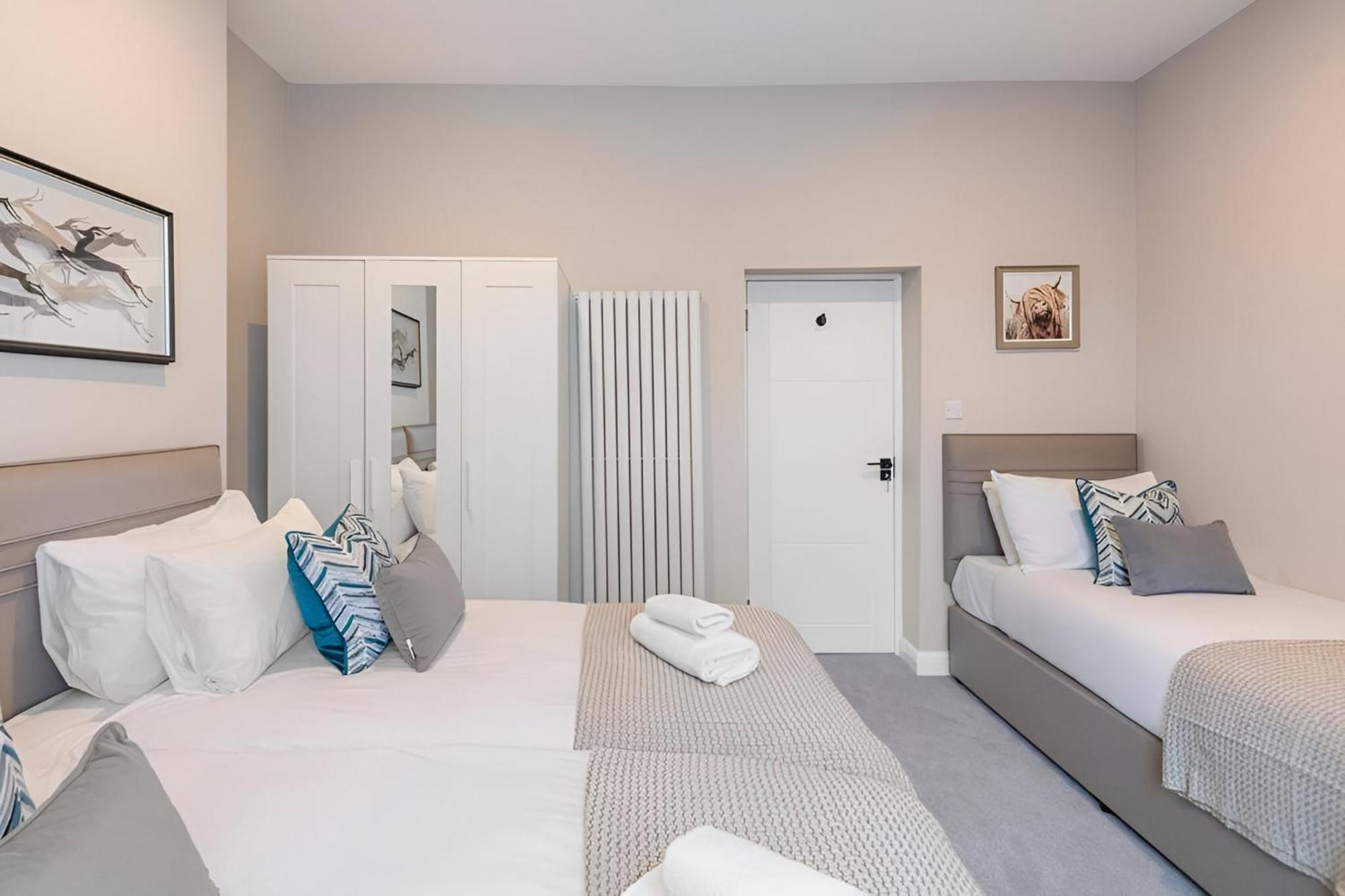Lägenhet Earthy Elegance Stylish 4br For Urban Escapes