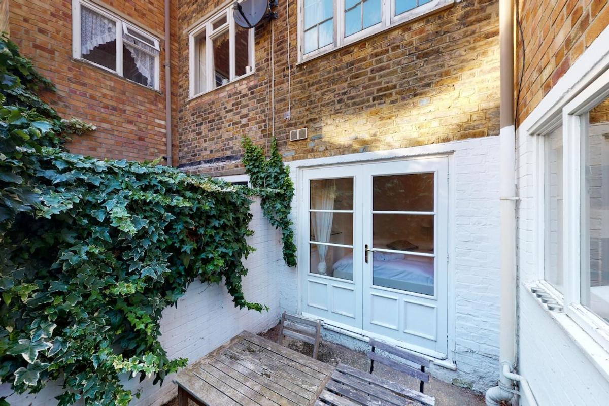 Apartment Bright 2-bed Garden Flat In West Kensington *