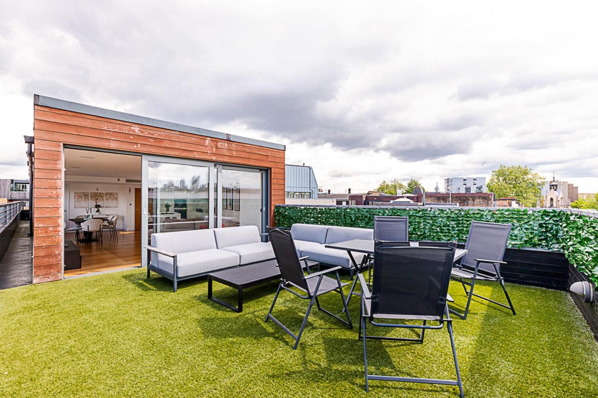 Modern Haven With Terrace View & Urban Charm