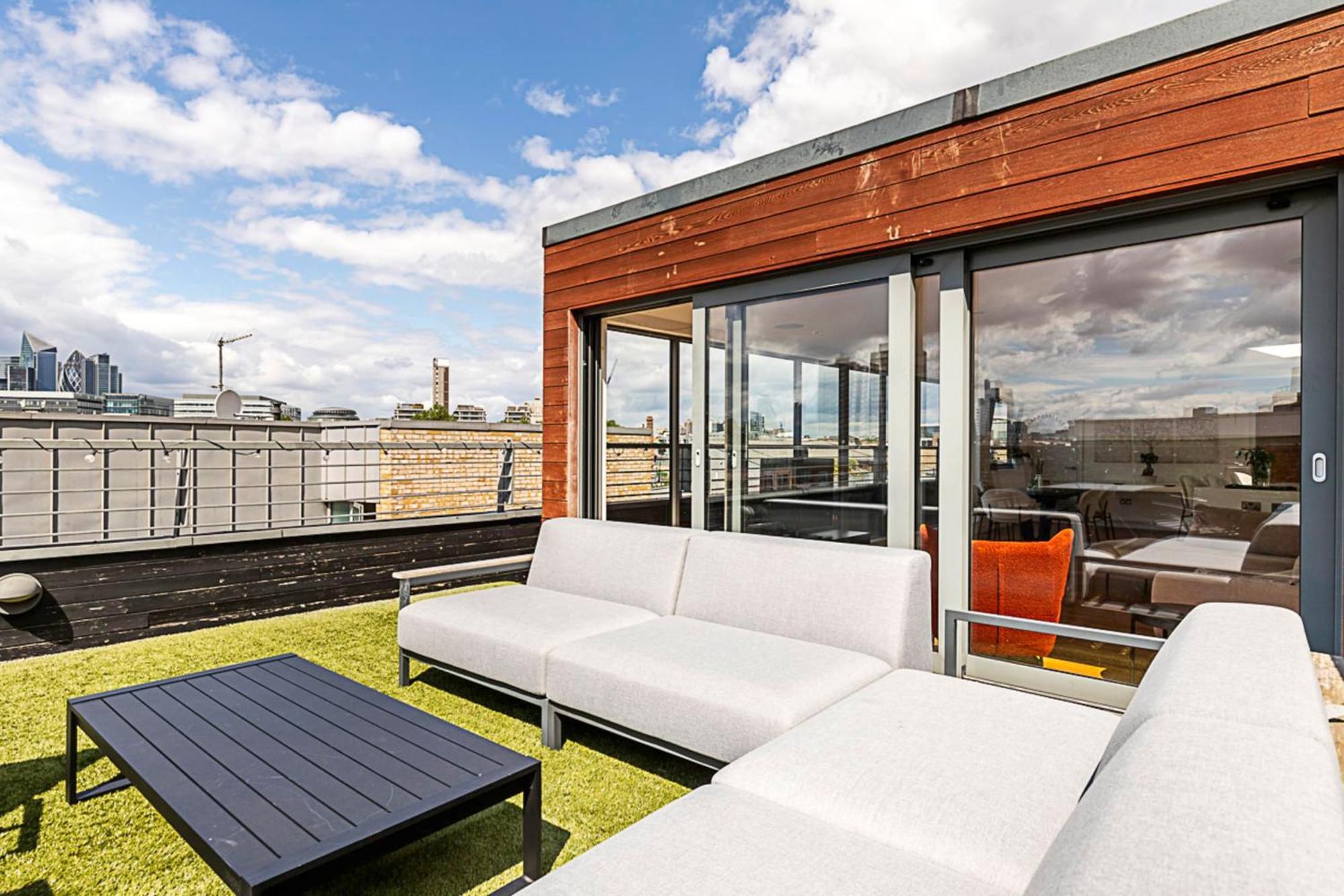 Modern Haven With Terrace View & Urban Charm