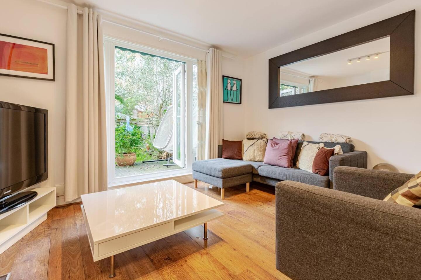 Charming 2-bed Garden Flat Appartamento *