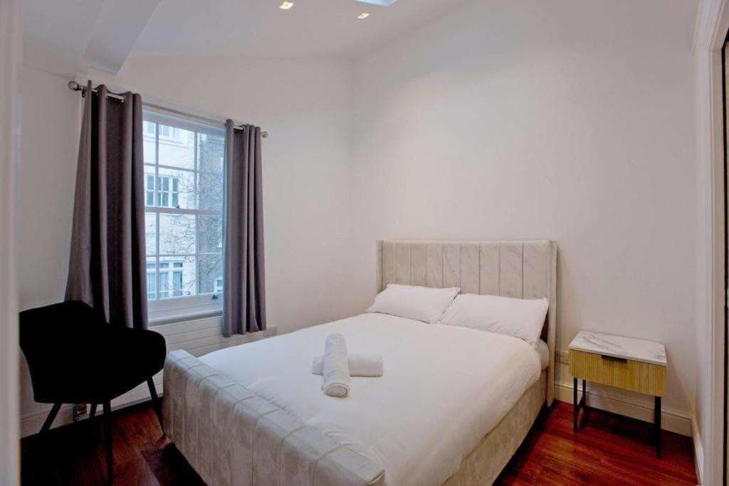 Charming Beau 2-bed Haven Near Harrods Apartment *